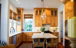 Kitchen w/ Floor-to-Ceiling Cabinets, Quartz Counters