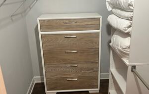 Walk-in closet in bedroom