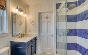 Second floor Jack 'n Jill bathroom with shower