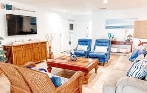 Charming Beach Cottage Steps from St. Pete Beach with Lagoon Pool & Dock - St. Pete Beach, Florida