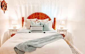 Charming Beach Cottage Steps from St. Pete Beach with Lagoon Pool & Dock - St. Pete Beach, Florida