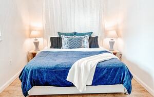 Charming Beach Cottage Steps from St. Pete Beach with Lagoon Pool & Dock - St. Pete Beach, Florida