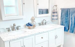 Charming Beach Cottage Steps from St. Pete Beach with Lagoon Pool & Dock - St. Pete Beach, Florida