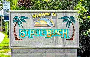 Charming Beach Cottage Steps from St. Pete Beach with Lagoon Pool & Dock - St. Pete Beach, Florida