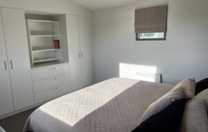 Master bedroom with built-in wardrobes