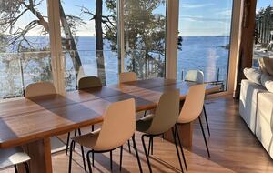 8-10 person dining table with 180 degree views of ocean