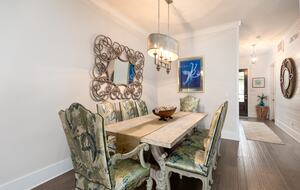 Dining for eight, and bar seating for four. Additional game table.