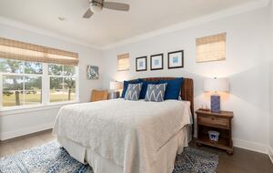 Upstairs primary bedroom with King sized bed