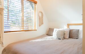 Queen Size Bed in this Fun & Unique Bedroom Upstairs