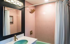 Fun period specific bathroom with original mint fixtures