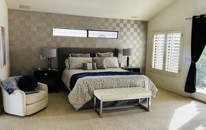 Master bedroom with views of yard spa and pool