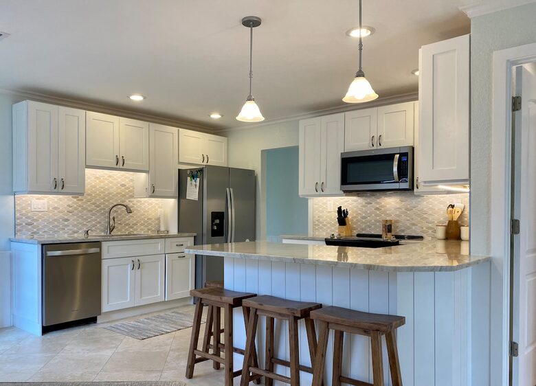 Quartzite Kitchen with marble backsplash