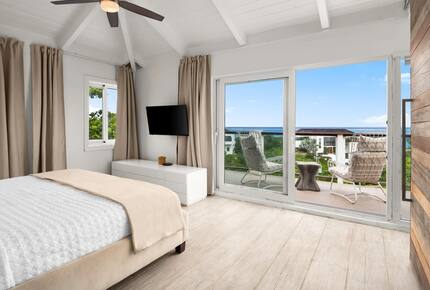 Master bedroom with sweeping views of Grace Bay and North Shore
