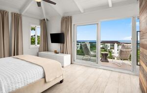 Master bedroom with sweeping views of Grace Bay and North Shore