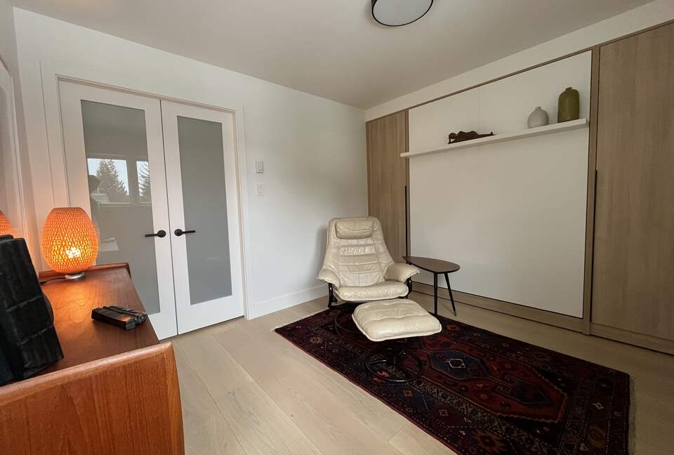 2nd floor office with murphy bed, access to upper north facing deck.