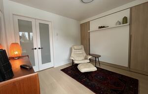 2nd floor office with murphy bed, access to upper north facing deck.