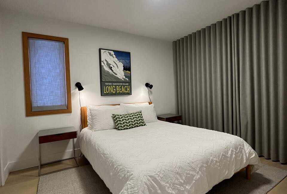 1st floor bedroom with Queen bed and access to lower deck (hot tub).