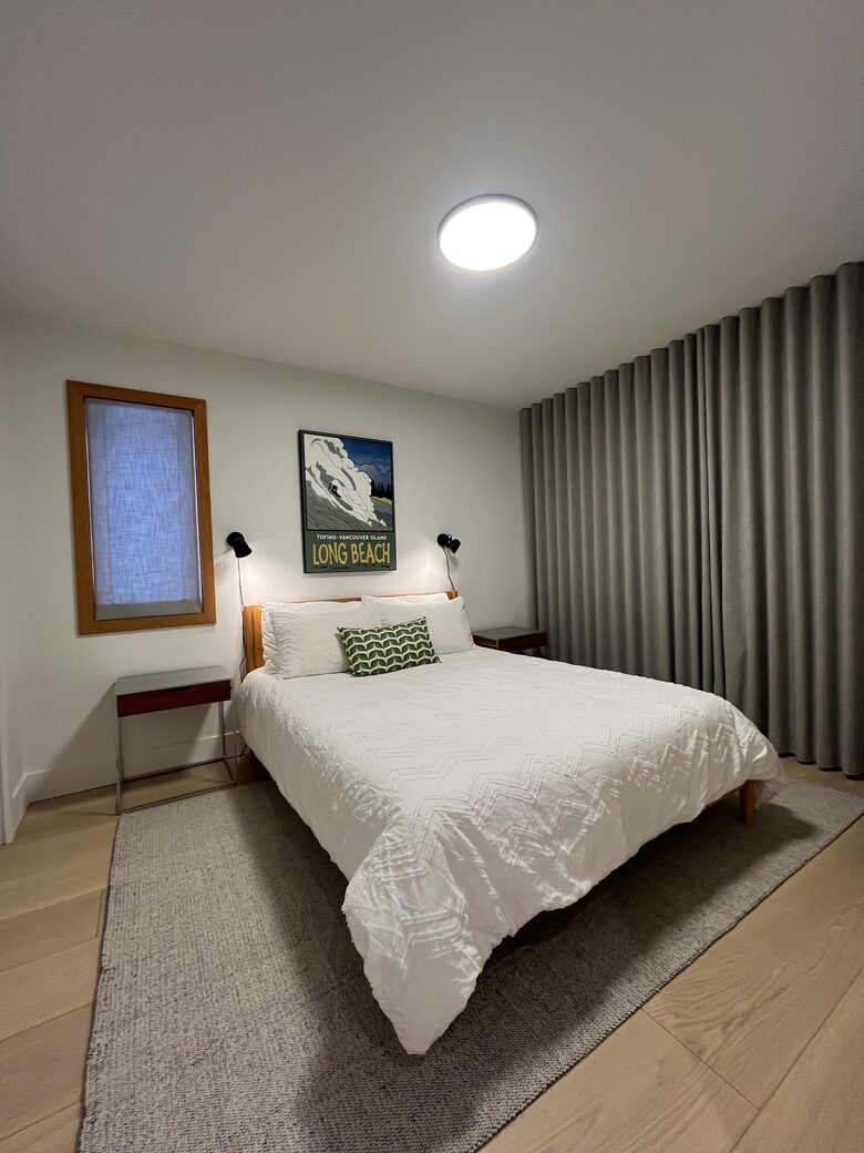 1st floor bedroom with Queen bed and access to lower deck (hot tub).