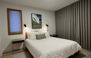 1st floor bedroom with Queen bed and access to lower deck (hot tub).