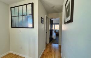 2nd floor hall leading to the 2 guest bedrooms