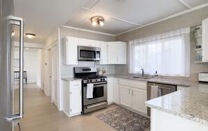 Sunlit Cottage Retreat with Waterfront Views - Stoughton, Wisconsin