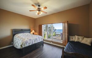 Third bedroom with King bed, trundle bed and lake views