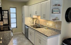 Brand new kitchen with Green appliances.