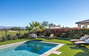 Lush green yard with pool and spa overlooking Stadium, PGA WEST