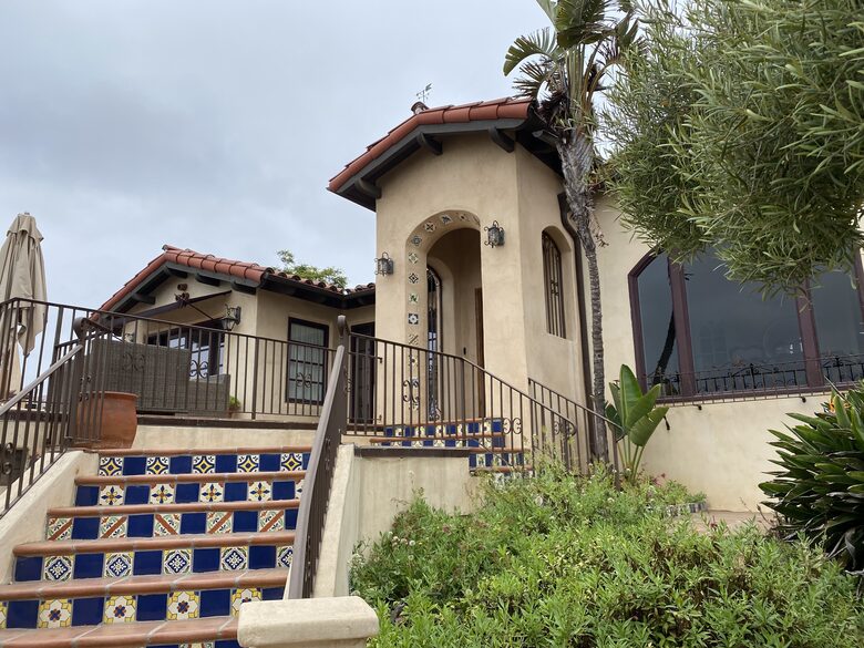 One flight of stairs up to the front door