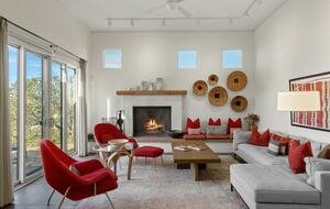 Spacious living room with sunset views and fireplace