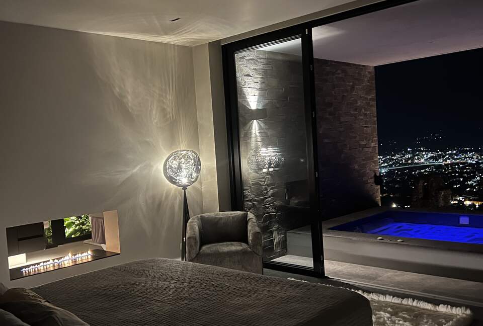 Downstairs Master Bedroom open to Jacuzzi Spa