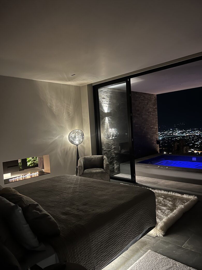Downstairs Master Bedroom open to Jacuzzi Spa