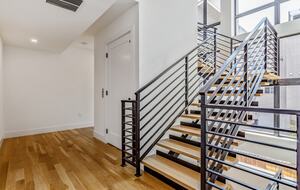 Second floor stairs and elevator