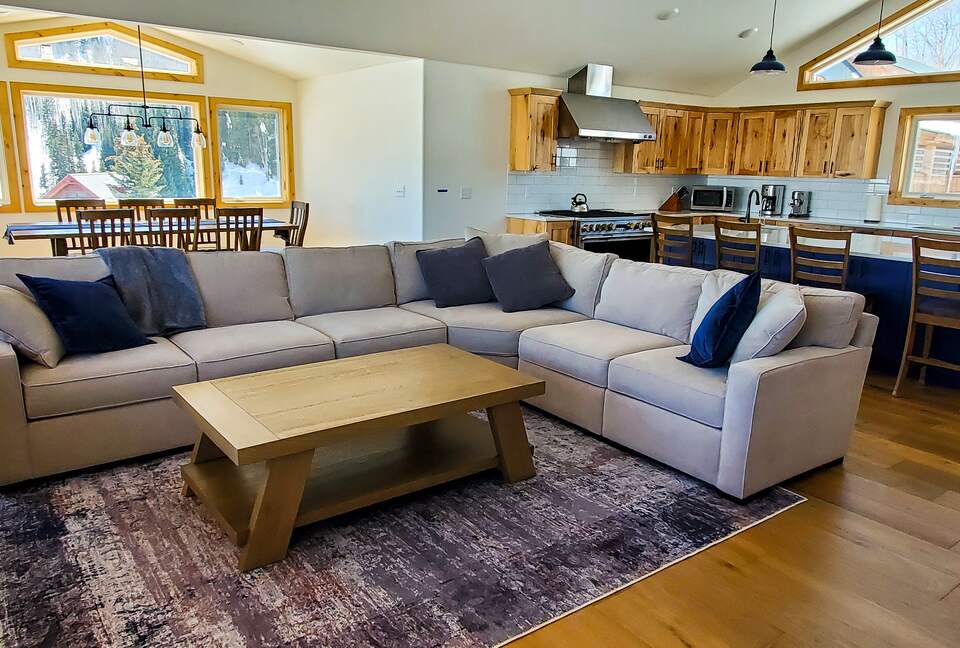Large open living plan with stunning views out every windown