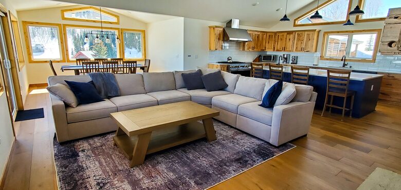 Large open living plan with stunning views out every windown