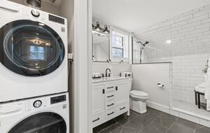 Master Bath with walk in shower, radiant heat floors and washer dryer