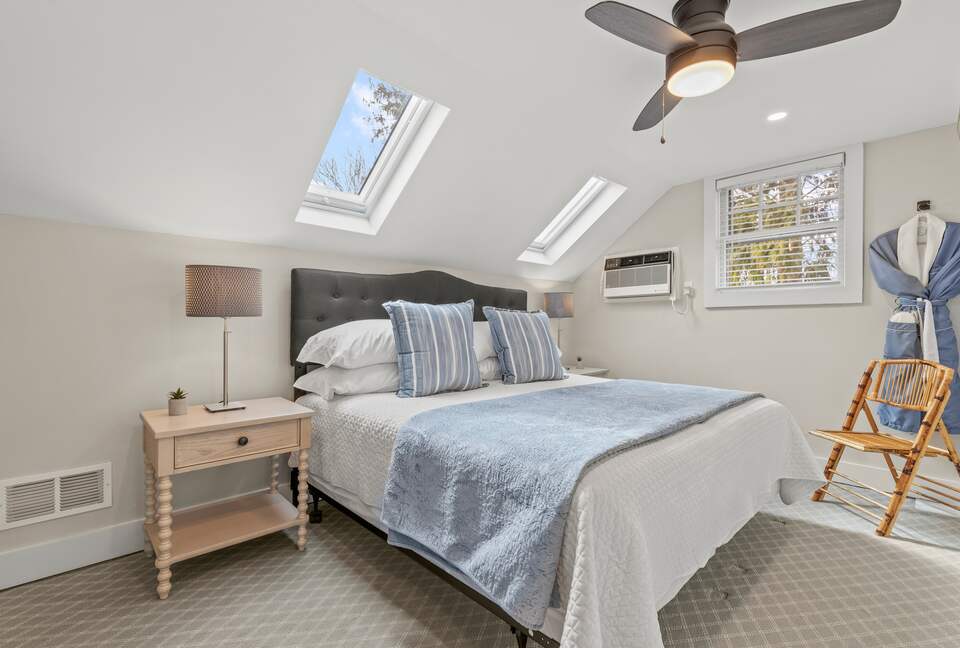 Master Bedroom with King Bed and skylights