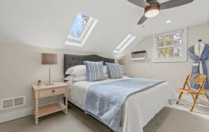 Master Bedroom with King Bed and skylights