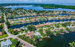Elegant Canal-Front Living with Private Dock & Pool - St. Petersburg, Florida