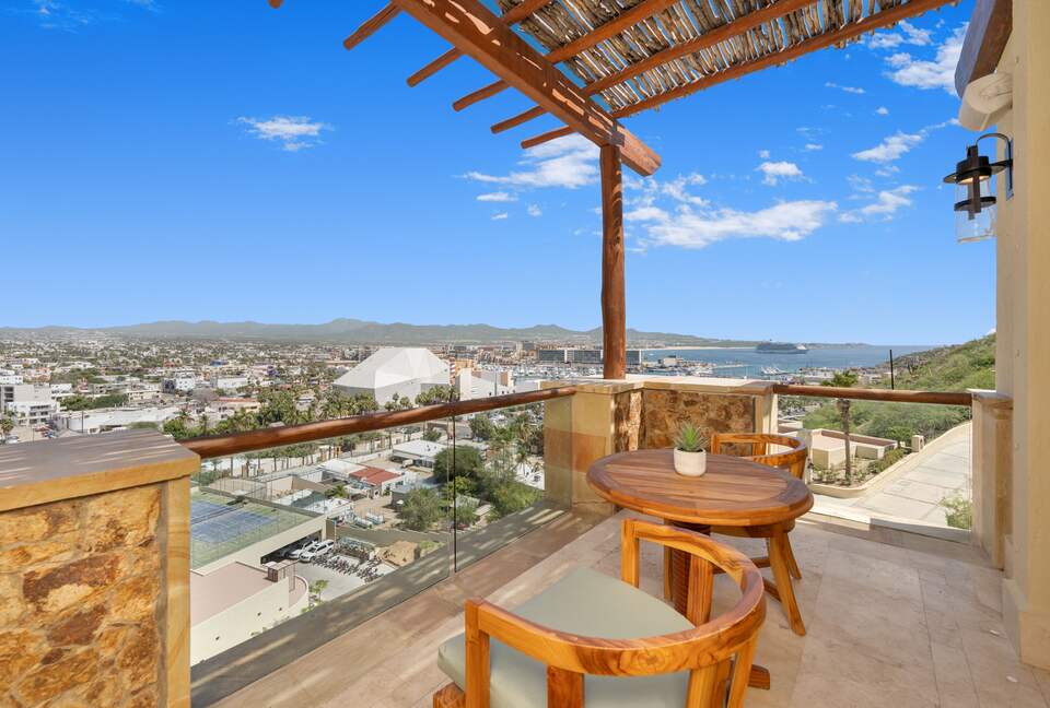 Balcony with marina and tennis court views (Double room)