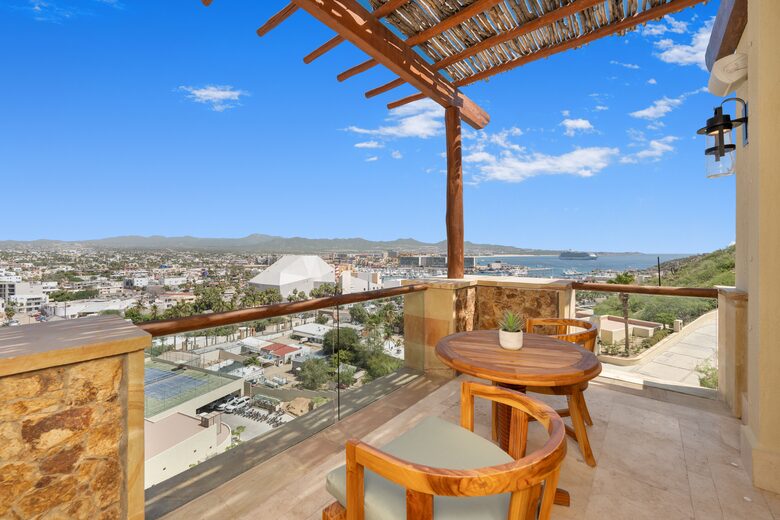 Balcony with marina and tennis court views (Double room)