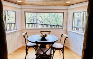 Breakfast nook with forest views