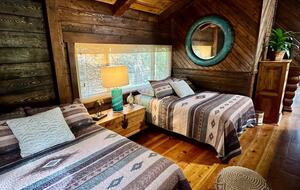 Loft bedroom with 2 full beds