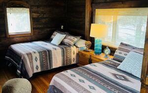 Loft bedroom with 2 full beds