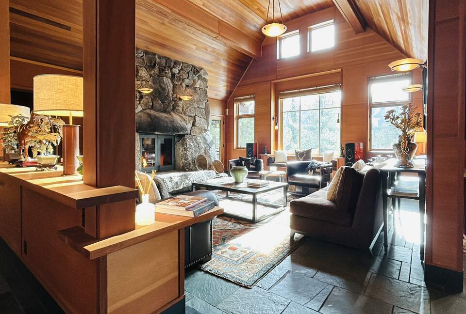 Living Room with dramatic mountain and forest views