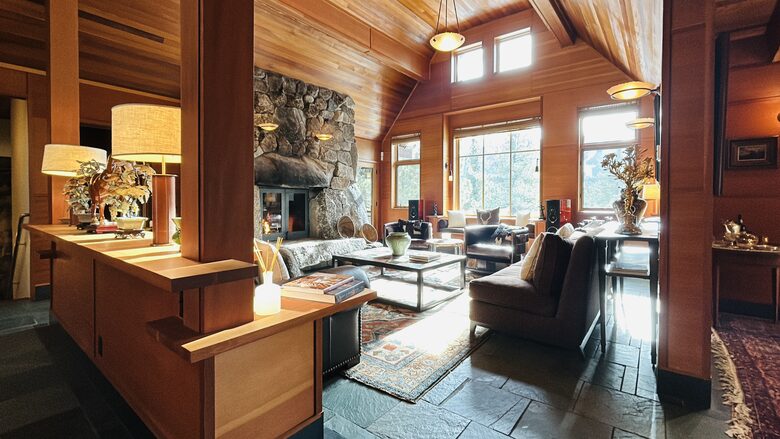 Living Room with dramatic mountain and forest views