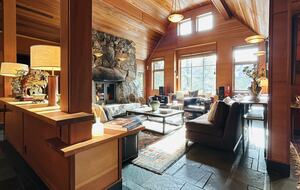 Living Room with dramatic mountain and forest views