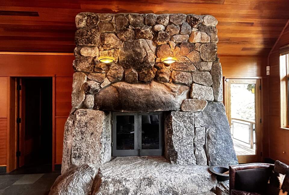 Living Room fireplace made of massive granite stones