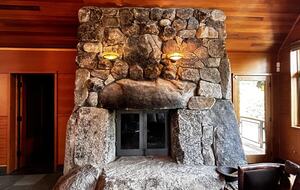 Living Room fireplace made of massive granite stones