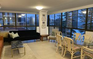 Huge dining area with 6 chair dining setting, two sofas and day bed